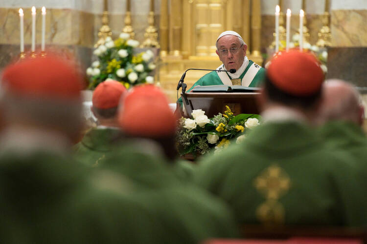 Pope Francis speaks as he celebrates Mass with about 50 cardinals in the Pauline Chapel of the Apostolic Palace at the Vatican June 27. The Mass marked the pope's 25th anniversary of his ordination as a bishop. (CNS photo/L'Osservatore Romano)