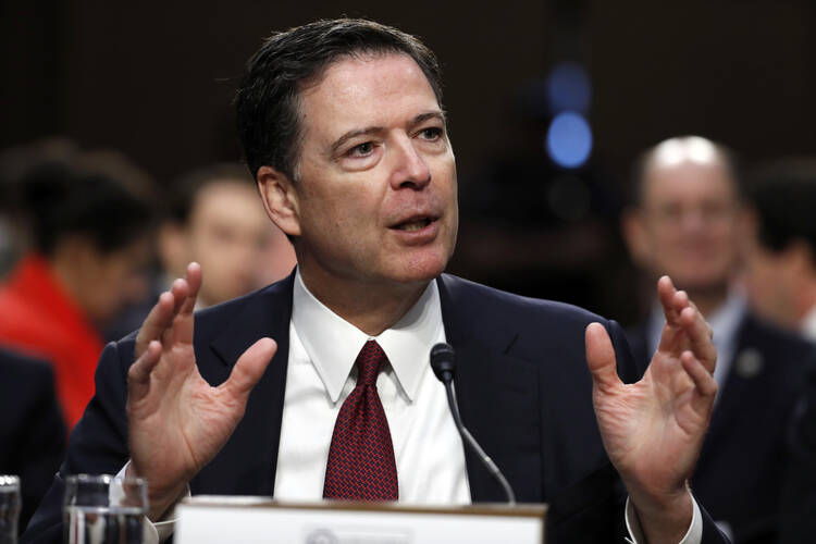 Former FBI Director James Comey testifies during a Senate Intelligence Committee hearing on Capitol Hill, Thursday, June 8, 2017, in Washington. (AP Photo/Alex Brandon)