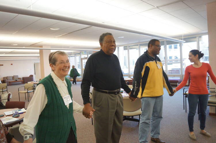 Mary Clare Fichtner, O.P., (far left) is joined by Springfield Dominican Anti-Racism Team members (left to right) Richard Bowen, Howard Derrick and Valeria Cueto. Photo courtesy of Springfield Dominicans.