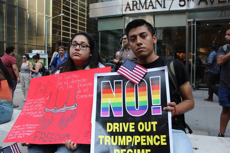 Dreamers protest the announcement of DACA's ending outside of Trump Tower in New York City on Sept. 5. (America Media photo/Antonio De Loera-Brust) 