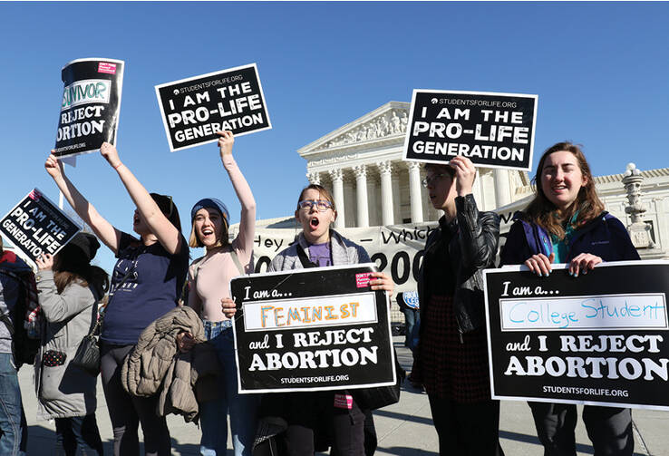 Young women in front of the U.S. Supreme Court during the 45th annual March for Life in Washington, D.C., Jan. 19, 2018 (CNS photo/Gregory A. Shemitz)