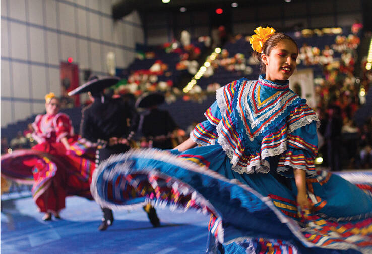 A baile folklórico dancer with Balet Alianza Latina performs during a celebration honoring Our Lady of Guadalupe, patroness of the Americas, in Houston in December 2016. (CNS photo/Victor Aleman, Angelus News)