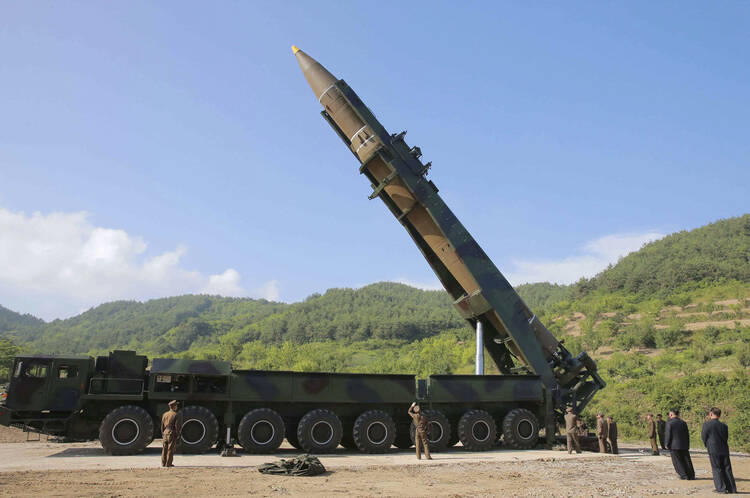 North Korean leader Kim Jong Un, second from right, inspects the preparation of the launch of a Hwasong-14 intercontinental ballistic missile (ICBM) in North Korea's northwest. (Korean Central News Agency/Korea News Service via AP, File)