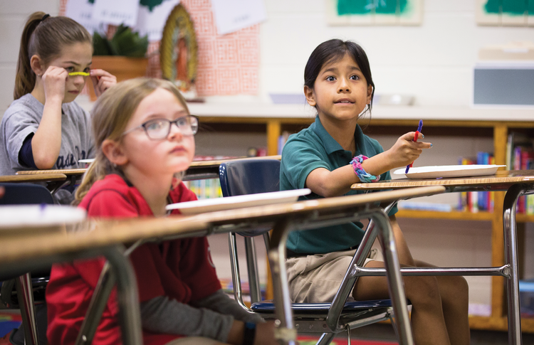 A second-grade Spanish class at Holy Name of Jesus Catholic School in Henderson, Ky., in March 2018. The school has 33 students registered as Hispanic for the 2018-19 academic year, up three from last year. (CNS photo/Tyler Orsburn)