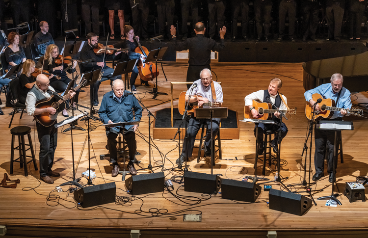 The St. Louis Jesuits at their final concert, on Sept. 29 at Powell Hall in St. Louis. From left, Tim Manion, John Foley, S.J., Bob Dufford, S.J., Dan Schutte and Roc O'Connor, S.J. (Don Doll, S.J.)