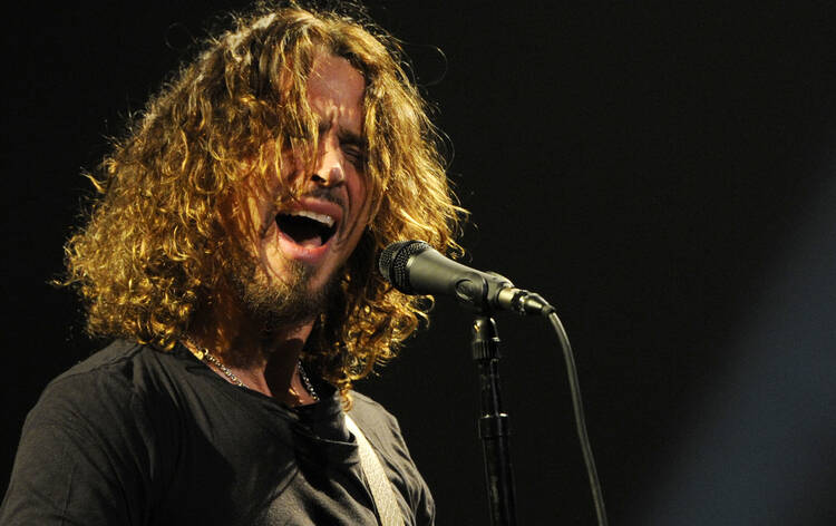 In this Feb. 13, 2013 file photo, Chris Cornell of Soundgarden performs during the band's concert at the Wiltern in Los Angeles (Photo by Chris Pizzello/Invision/AP, File)