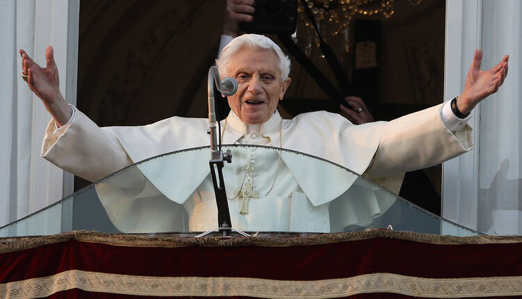 In this Thursday, Feb. 28, 2013 file photo, Pope Benedict XVI greets the crowd from the window of the Pope's summer residence of Castel Gandolfo, the scenic town where he will spend his first post-Vatican days and make his last public blessing as pope. (AP Photo/Andrew Medichini, File)