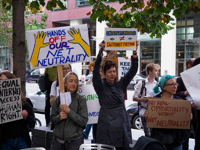 Demonstrators join a "protect net neutrality" rally in San Francisco in September 2017. Photo courtesy of wikicommons.