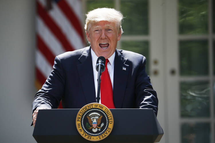 President Donald Trump speaks about the U.S. role in the Paris climate change accord on Thursday, June 1, 2017, in the Rose Garden of the White House in Washington. (AP Photo/Pablo Martinez Monsivais)