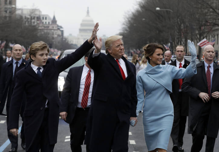 President Donald J. Trump walks in his inauguration parade on Jan. 20 (AP Photo/Evan Vucci, File).