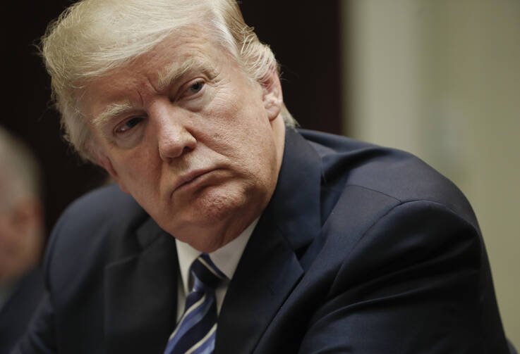 President Donald Trump listens during a meeting on healthcare in the Roosevelt Room of the White House in Washington, Monday, March 13, 2017. (AP Photo/Pablo Martinez Monsivais)