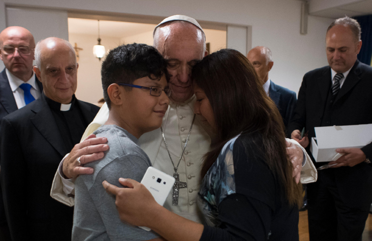 Pope Francis visits patients at the Villa Speranza hospice, which is connected to Gemelli Hospital, in Rome Sept. 16. The visit was part of the pope's series of Friday works of mercy during the Holy Year. (CNS photo/L'Osservatore Romano, handout)