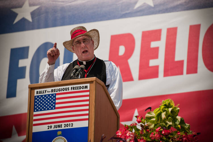 Archbishop Joseph F. Naumann of Kansas City, Kan., speaks at a rally for religious freedom June 29, 2012, at the state Capitol in Topeka. The Kansas Catholic Conference estimated the crowd at 4,000. (CNS/Lori Wood Habiger, The Leaven)