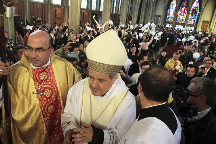 Bishop Juan Barros attends his first Mass at the Cathedral of St. Matthew in Osorno, Chile, March 21 (CNS photo/Carlos Gutierrez, Reuters). 