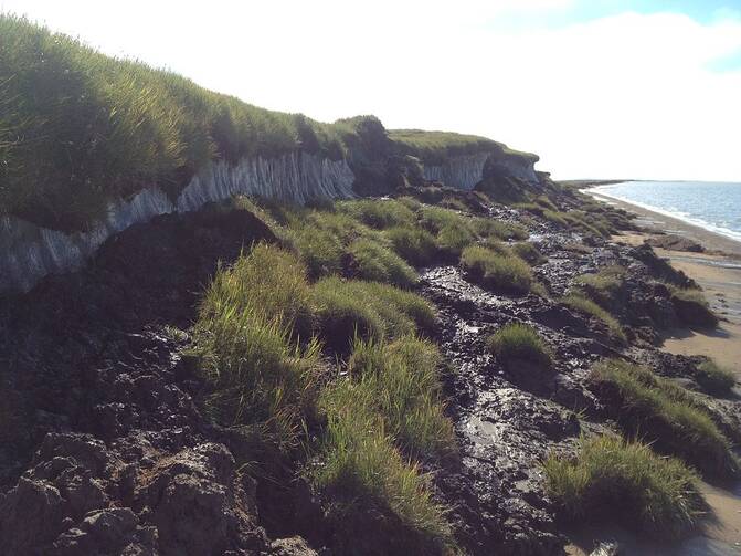 Rapidly thawing Arctic permafrost and coastal erosion on the Beaufort Sea, Arctic Ocean, near Point Lonely, AK. Photo Taken in August, 2013.