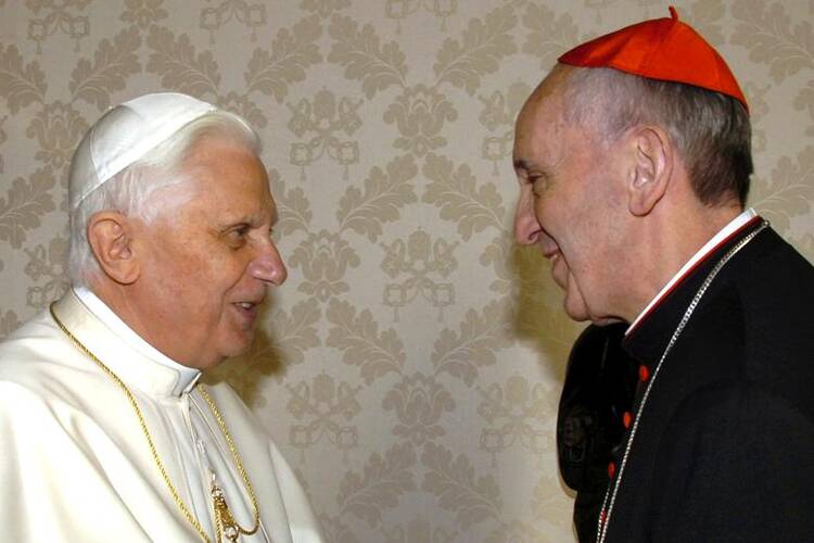 Pope Benedict XVI meets Cardinal Jorge Mario Bergoglio at the Vatican in 2007. AFP: Arturo Mari/Osservatore Romano