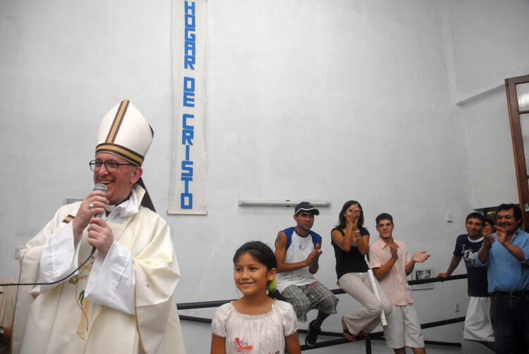 HIS ROOTS. Cardinal Jorge Mario Bergoglio presides at a Holy Thursday Mass in 2008 at a church in a poor section of Buenos Aires, Argentina. 