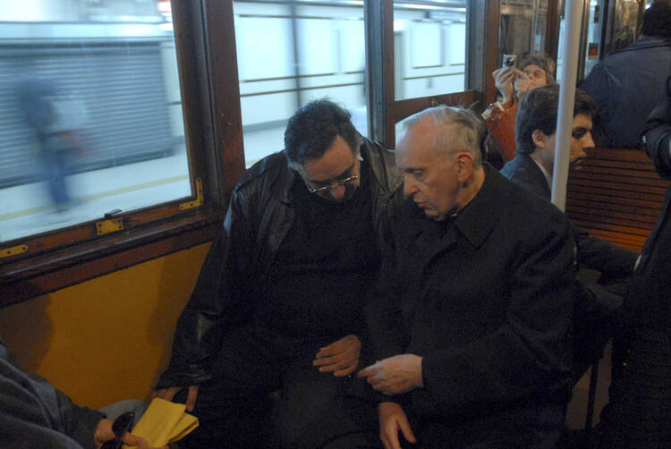 Argentine Cardinal Bergoglio, now Pope Francis, pictured travelling by subway in Buenos Aires.