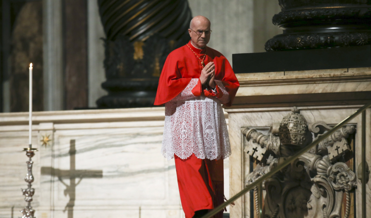 Cardinal Tarcisio Bertone, former Vatican secretary of state, walks during the Good Friday service in St. Peter's Basilica at the Vatican March 25. (CNS photo/Alessandro Bianchi, Reuters)