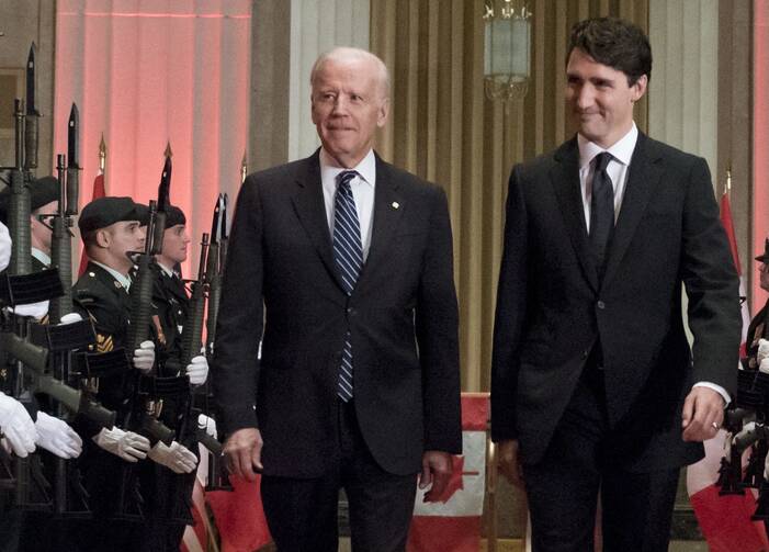 We're Looking to You, Kid. Prime Minister Justin Trudeau and U.S. Vice-President Joe Biden arrive at a state dinner on Thursday, Dec. 8, 2016 in Ottawa. (Justin Tang/The Canadian Press via AP)