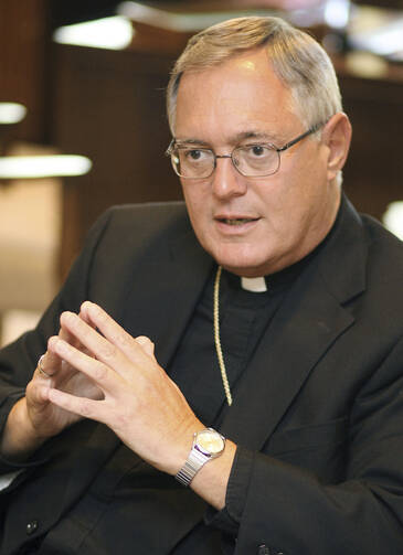 In this Aug. 21, 2008 file photo, Bishop Thomas Tobin speaks during an interview in his office in Providence, R.I. In an essay published Tuesday, May 10, 2016, Tobin wrote his opposition to legalizing marijuana in the state. (AP Photo/Stew Milne, File)