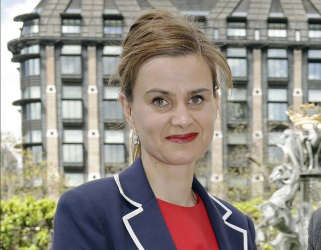 Labour Member of Parliament Jo Cox poses for a photograph. British lawmaker Cox has died after a shooting incident near Leeds, in West Yorkshire, England, it has been reported, Thursday June 16, 2016. (Yui Mok/PA via AP, File)