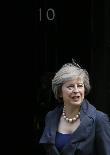 Britain's Home Secretary Theresa May arrives to attend a cabinet meeting at 10 Downing Street, in London, on July 12. Theresa May will become Britain's new Prime Minister on Wednesday. (AP Photo/Kirsty Wigglesworth)