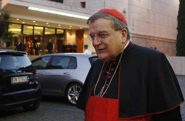 Cardinal Raymond L. Burke, prefect of the Supreme Court of the Apostolic Signature, leaves the concluding session of the extraordinary Synod of Bishops on the family at the Vatican Oct. 18. (CNS photo/Paul Haring)