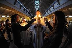Pictured is th e Easter Vigil service at Our Lady of Lourdes Parish in De Pere, Wisc. (CNS file photo/Sam Lucero, The Compass) (July 5, 2013)