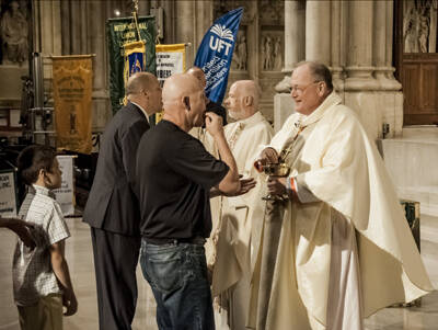 Cardinal Dolan celebrates Labor Mass in 2012