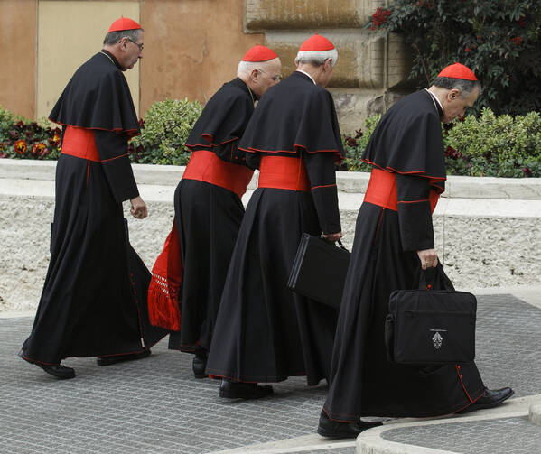 U.S. Cardinals Roger M. Mahony, Francis E. George, Donald W. Wuerl and Daniel N. DiNardo arrive for a general congregation meeting March 5. (CNS photo/Paul Haring)