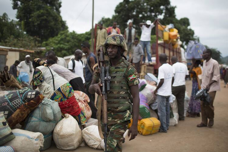 African Union troops supervise an evacuation in early May in Bangui.