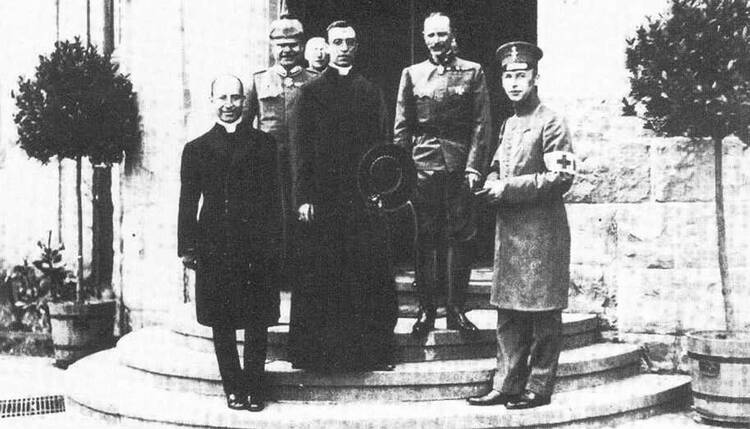 Archbishop Eugenio Pacelli, center, representing Pope Benedict XV, at the imperial Headquarters in 1917.
