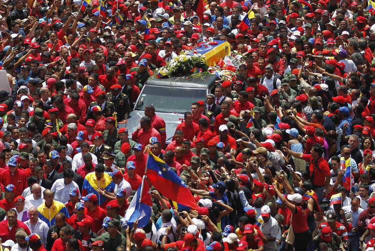 Coffin of Venezuela President Hugo Chavez driven through streets of Caracas after leaving military hospital
