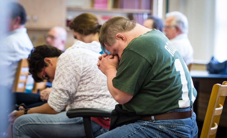 BLESSED LIVES. Volunteers and participants at a retreat for adults with cognitive disabilities at St. Katharine Drexel Church in Kaukauna, Wis., Sept. 20, 2014 (CNS photo/Sam Lucero, The Compass).