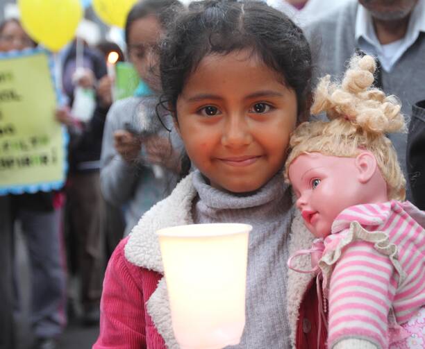 Ruby Arazabel, 6, takes part in a Nov. 30 vigil for climate change on the eve of the U.N. climate summit in Lima, Peru. (CNS photo/Barbara Fraser)