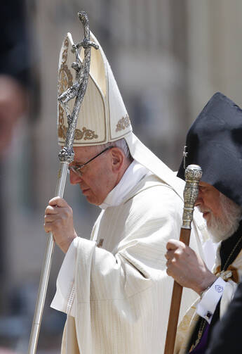 Pope Francis and Catholicos Karekin II, patriarch of the Armenian Apostolic Church, leave in procession after the pope celebrated Mass in Vartanants Square in Gyumri, Armenia, June 25 (CNS photo/Paul Haring).