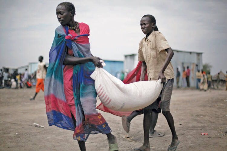 A food delivery in Pibor, South Sudan, in January 2012.