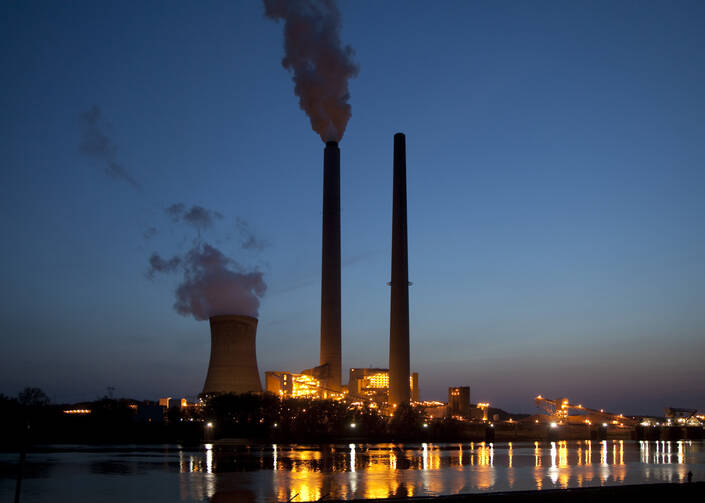 Smoke from the American Electric Power's coal-fired Mountaineer Power Plant, along the banks of the Ohio River in New Haven, W.Va., is seen in this file photo.