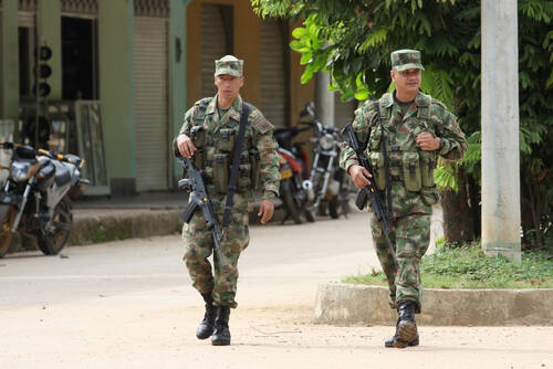 Soldiers patrol the city in November 8; 2012 in La Macarena; Colombia .