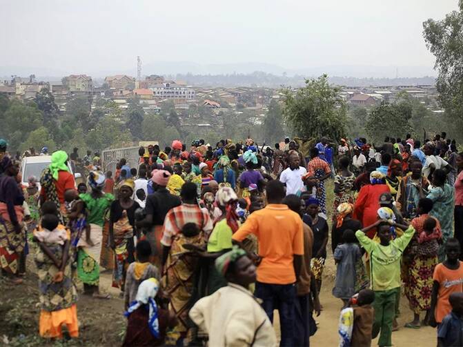 People who fled from their homes after recent ethnic violence take refuge at a camp for displaced people in Bunia, eastern Congo, on Feb. 17, 2018. Ethnic violence in Congo's northeast has forced more than 32,000 to flee to Bunia, where humanitarian assistance is strained and the suffering are eager for improved conditions. (AP Photo/Al-Hadji Kudra Maliro)