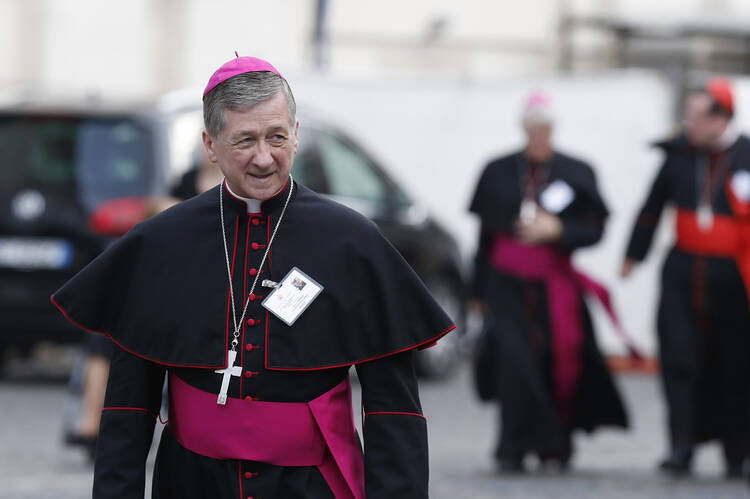 Archbishop Blase J. Cupich of Chicago arrives for a session of the Synod of Bishops on the family at the Vatican Oct. 14. (CNS photo/Paul Haring)