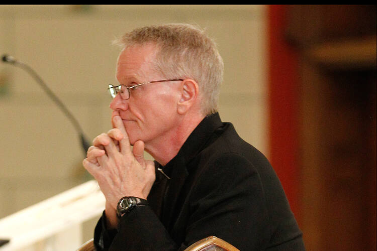 Bishop-Elect David Konderla prays at Holy Family Cathedral during his first stop in Tulsa (Photo credit: Dave Crenshaw - Eastern Oklahoma Catholic)