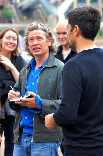 Actor/director Dexter Fletcher signs autographs in London on July 11, 2009 (WikiCommons)