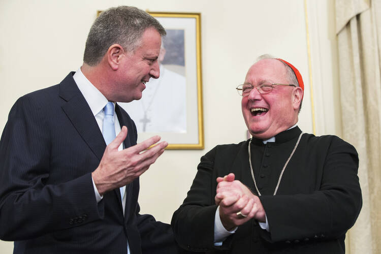 New York City Mayor Bill de Blasio with New York Cardinal Timothy M. Dolan following a meeting at the cardinal's residence on Jan. 13, 2014. (CNS photo/Lucas Jackson, Reuters)