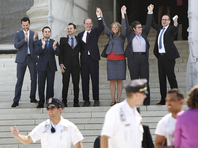 Attorney, plaintiffs in case against California's Proposition 8 celebrate supporters on steps of Supreme Court in Washington (CNS photo/Jonathan Ernst, Reuters)..