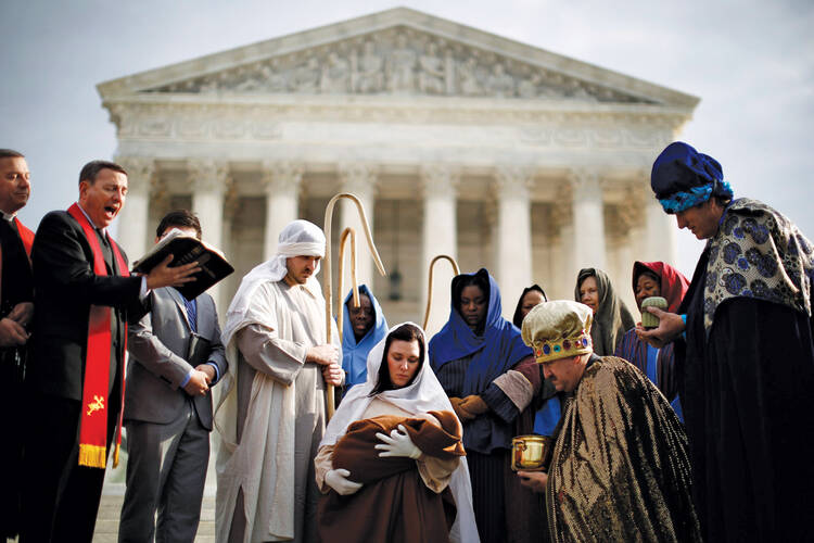 CATHOLIC APPEAL. Actors dressed for a Nativity scene are pictured during a prayer gathering in front of the Supreme Court in Washington, D.C., on Dec. 3, 2013. 