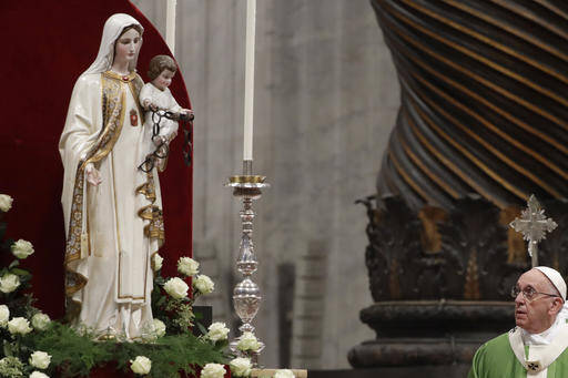  Pope Francis stares at a statue of the Holy Mary as he celebrates the Holy Mass for the Jubilee of inmates, at St. Peter's Basilica at the Vatican, Sunday, Nov. 6, 2016. (AP Photo/Gregorio Borgia)