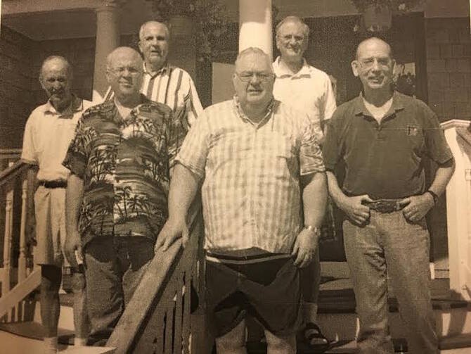 Edward Glynn, S.J., center, in Sea Bright, N.J., with his fellow Jesuits