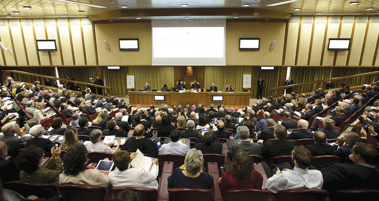 CALL TO ACTION. Journalists attend a news conference for the presentation of Pope Francis’ new encyclical, “Laudato Si’,” at the Vatican on June 18, 2015. 